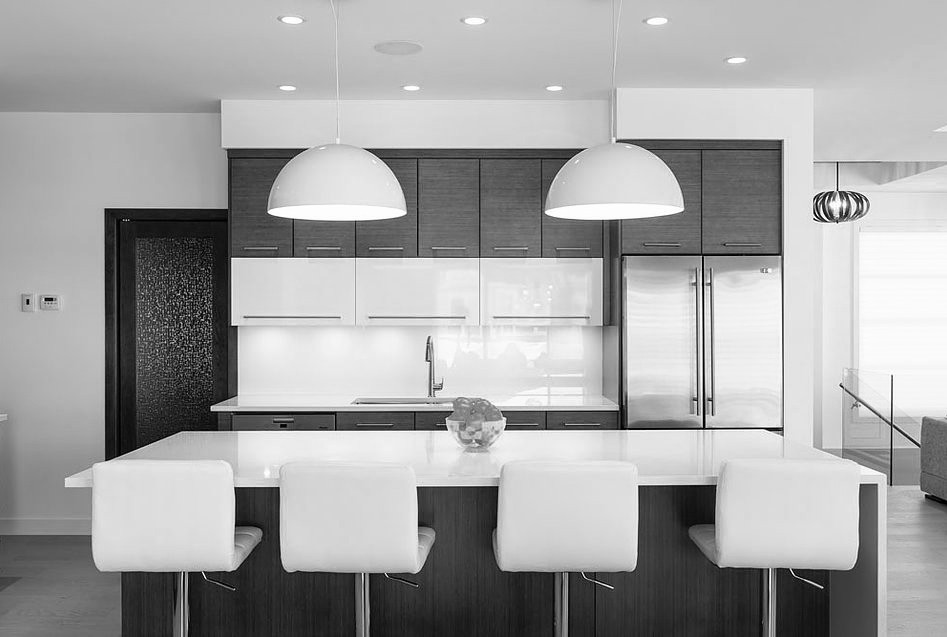 Modern two-tone kitchen with quartz island and dome pendants — W Design Group project