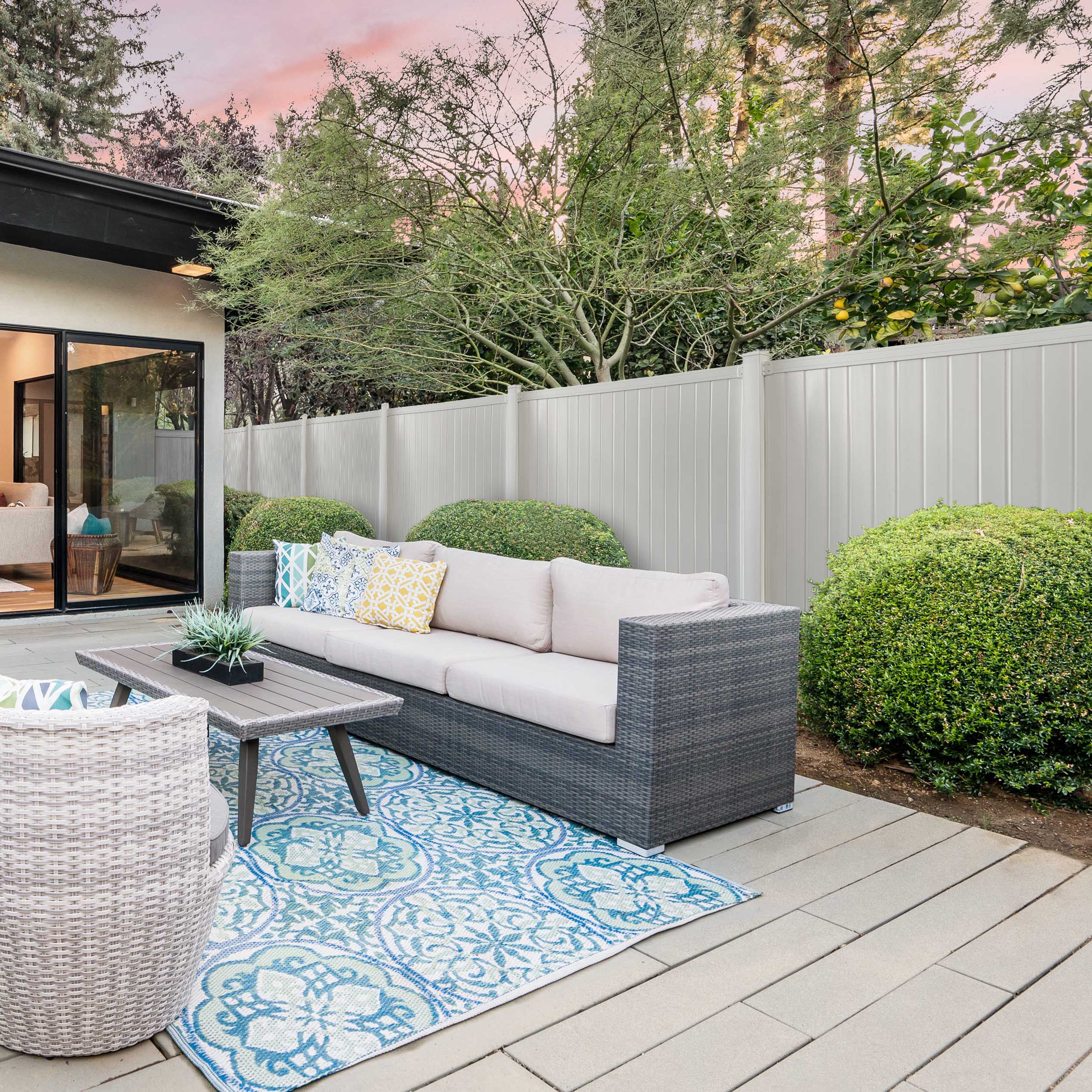 EverHome white vinyl privacy fence around modern patio