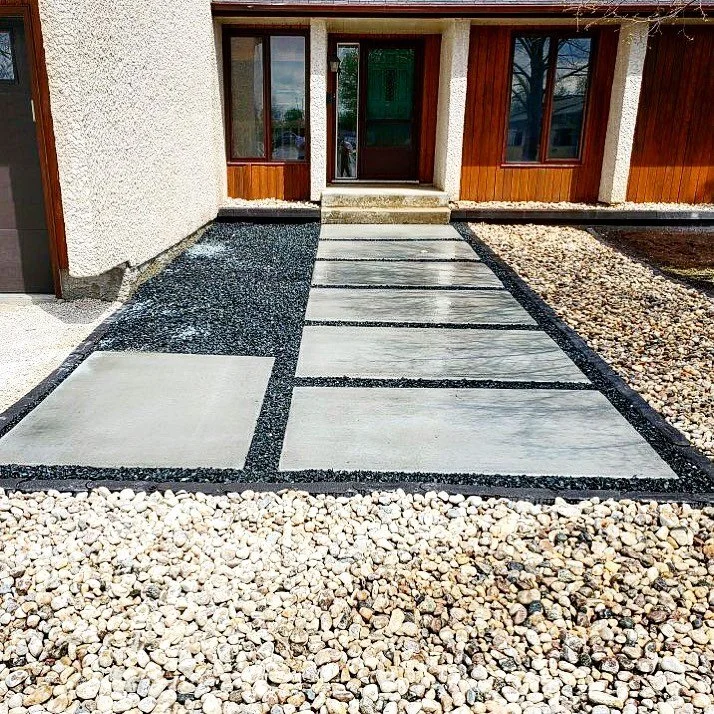 Spruce up your front entry with a Segmented concrete walkway. 

Give us a call for your free estimate today! 204-612-694